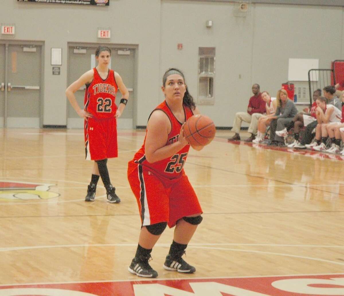 Tiger Erin Bell attempts a free throw during the fourth quarter in Alton. Edwardsville defeated the Redbirds 82-15.