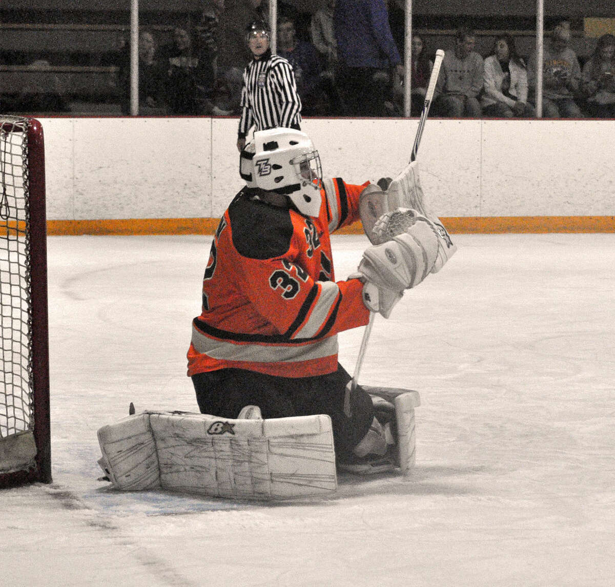 Edwardsville goalie Brady Griffin makes a blocker save in the second period during a Bethalto power play at the East Alton Ice Arena on Tuesday. 