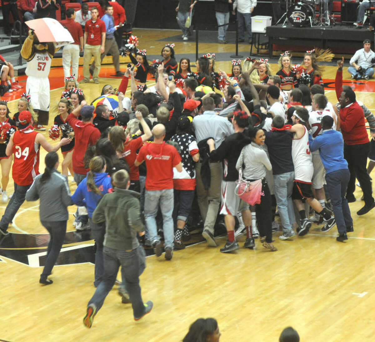 Cougar fans rush the floor after SIUE shocks the Racers in a 65-60 win.
