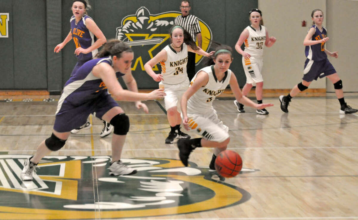 Metro-East Lutheran’s Mackenzie Gocal chases down a loose ball into the back court late in the fourth quarter.