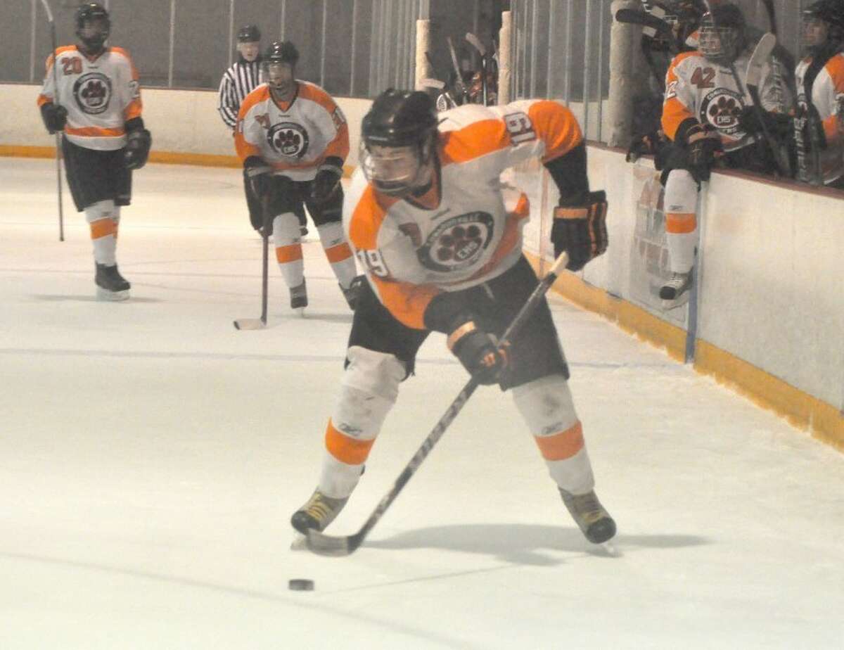 EHS' Brad Ringwald brings the puck up the ice on Thursday against the Redbirds.