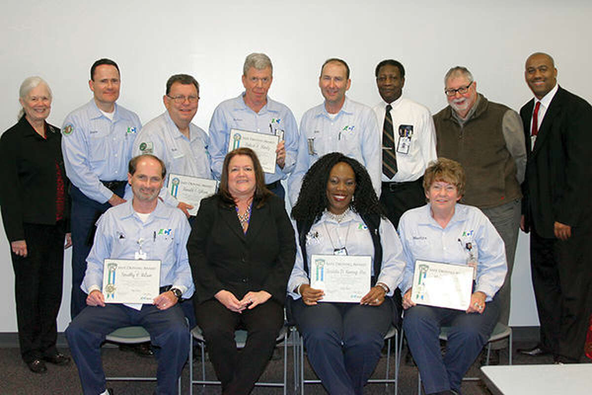 Front row, from left: ACT Award Recipient Tim Wilson, ACT Manager of Fixed-Route Operations Pam Ruyle, and ACT Award Recipients Zereeta Kinney-Lee and Marilyn Elick. Back row, from left: ACT Board President Sally Ferguson, ACT Award Recipients David Forbes, Ron Gibson, Bob Slantz and Eric Fry, ACT Lead Road Supervisor Charles Cannon, ACT Board Member Dan Corbett and ACT Fixed-Route Dispatch Supervisor Delanders Crochrell.