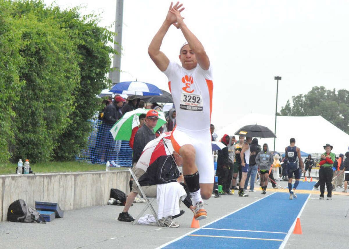Edwardsville’s Julian Harvey competes in the triple jump at the Class 3A state meet Saturday at Eastern Illinois University. He finished sixth in the event, earning four points for the Tigers.