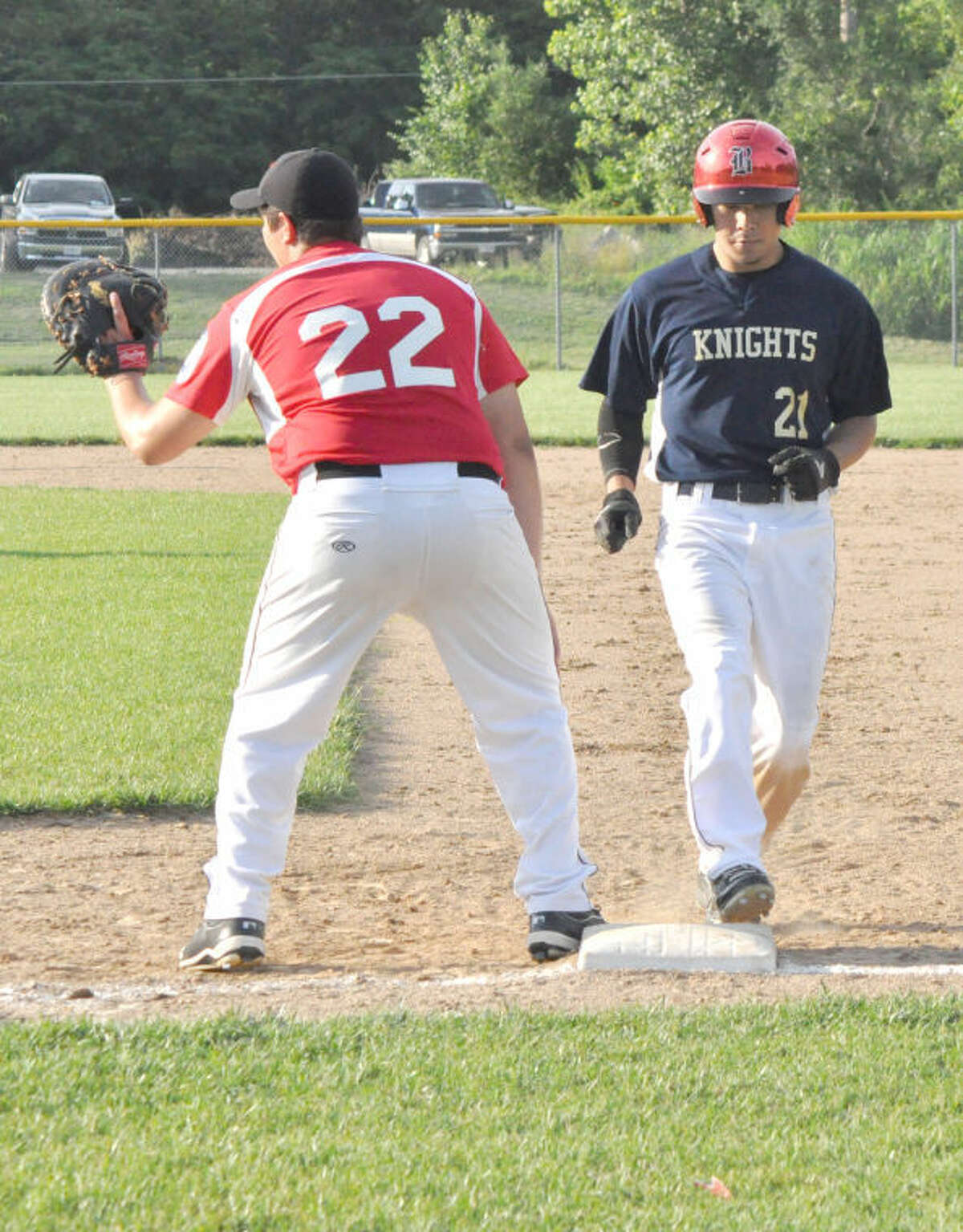 Post 435’s Matt Mokriakow gets back to first base on a pickoff attempt by Troy on Wednesday.
