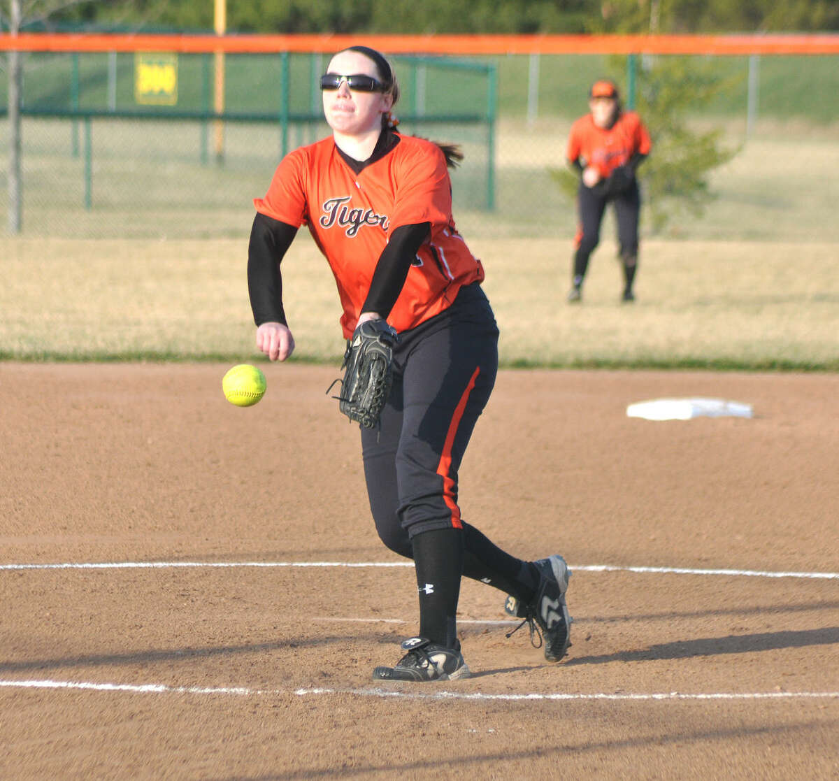 Edwardsville junior Allison Loehr delivers a pitch during the second inning of Monday’s season opener against Gillespie at EHS,