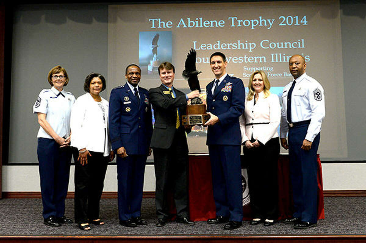 Left to Right: Air Mobility Command Command Chief CMSgt Victoria Gamble, Mrs. Evelyn McDew, Air Mobility Command Commander Gen. Darren McDew, Chair of the Military Affairs Committee for the Abilene Chamber Gray Bridwell, Installation Commander and Commander 375th Air Mobility Wing Col. Kyle Kremer, Mrs. Deb Kremer, and 375th Air Mobility Wing Command Chief CMSgt Wes Mathias.