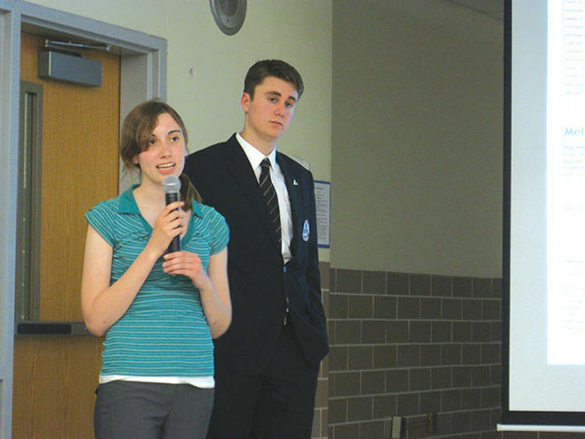 Edwardsville High School students Rebecca Laurent and Jacob Vandever speak at a recent Edwardsville District 7 Board of Education meeting.