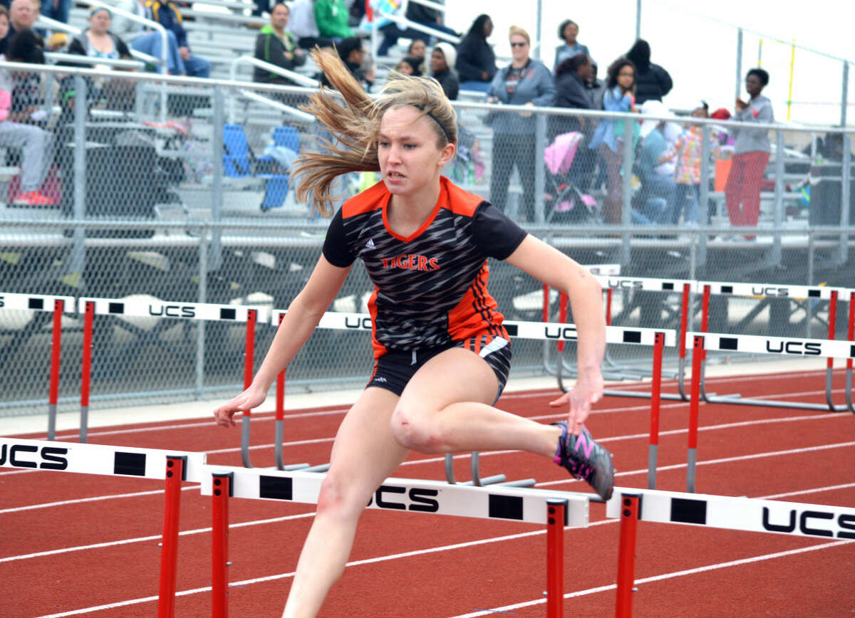 EHS freshman Elise Krone competes in the 100-meter hurdles.