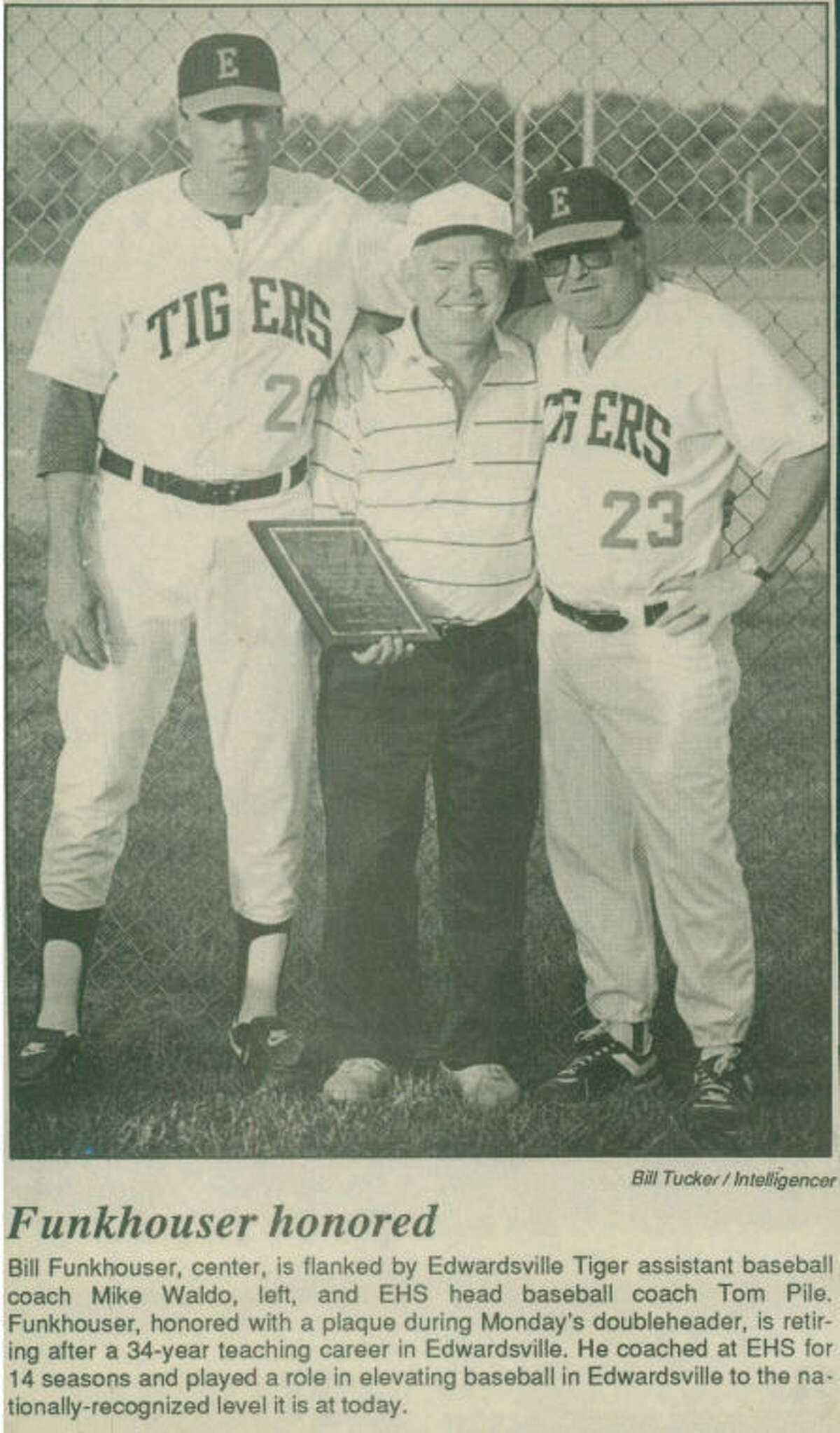 Pictured from left to right are: Mike Waldo, Bill Funkhouser and Tom Pile. This Intelligencer file photo shows Waldo and Pile posing with Funkhouser and a plaque honoring his 24-year teaching career and 14-year career as the head baseball coach at Edwardsville. Funkhouser gave Waldo his break as a volunteer coach at EHS and Waldo found true success coaching alongside Pile on his way to being a part of his 1,000th win with the baseball program  during the recent 2014 season.