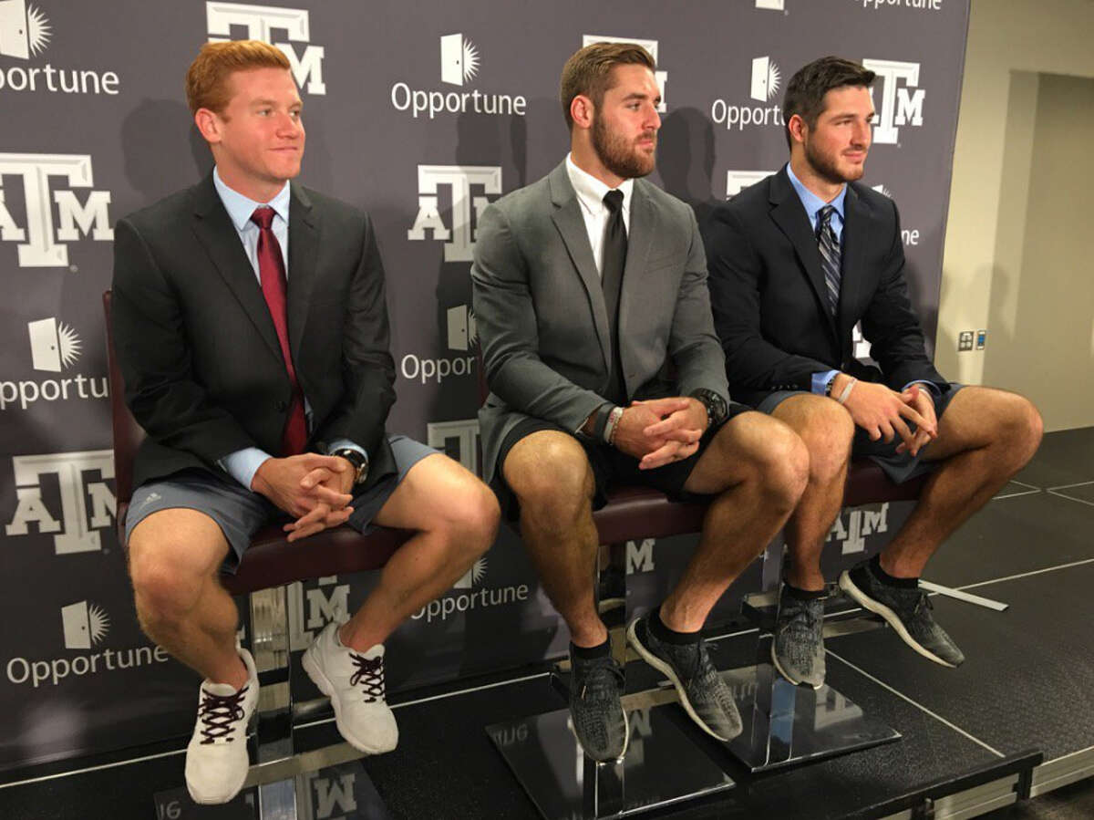 Texas A&M quarterbacks (from left) Conner McQueen, Trevor Knight and Jake Hubenak showed up for Tuesday's press conference in coat and tie and shorts.