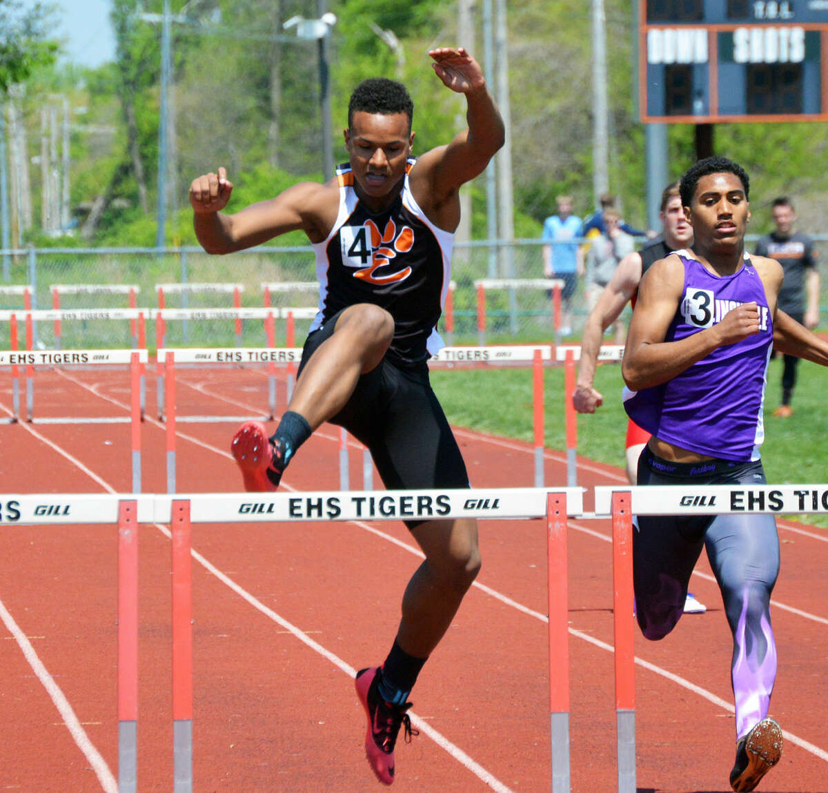 Edwardsville's Travis Anderson competes in the 300-meter hurdles
