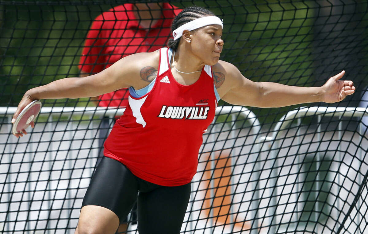 Emmonnie Henderson throws the discus during a University of Louisville track and field meet. 