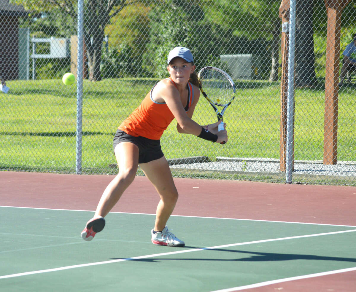 EHS sophomore Grace Desse waits to hit a backhand in No. 2 doubles.