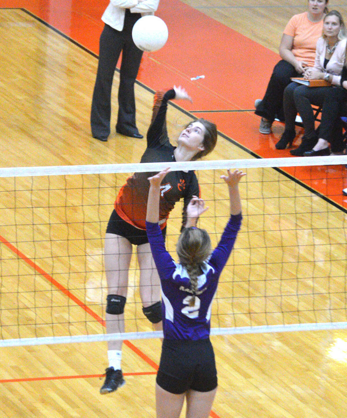 Edwardsville sophomore Kate Martin goes up for a kill during Thursday’s home match against Collinsville.