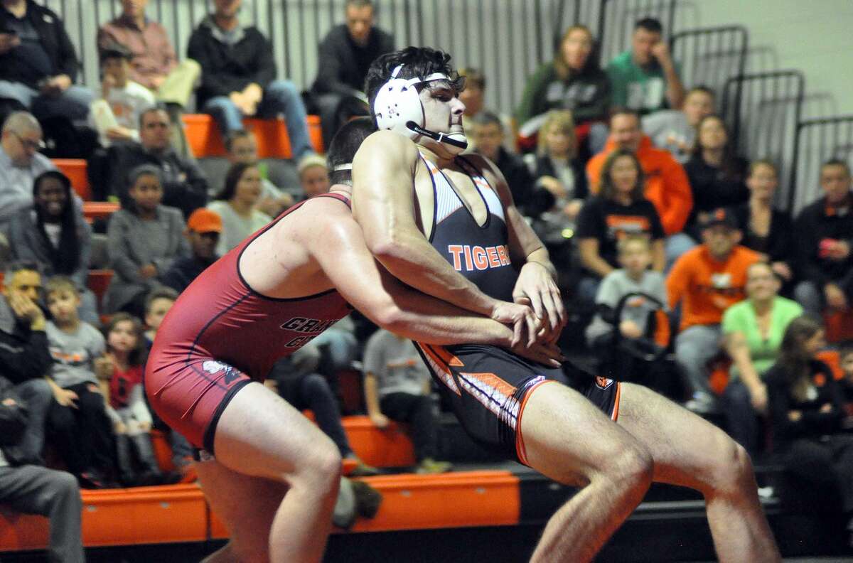Edwardsville’s Cam Blair wrestles Granite City’s Michael Bailey in a 195-pound match during Thursday’s Southwestern Conference dual meet at the Jon Davis Wrestling Center.