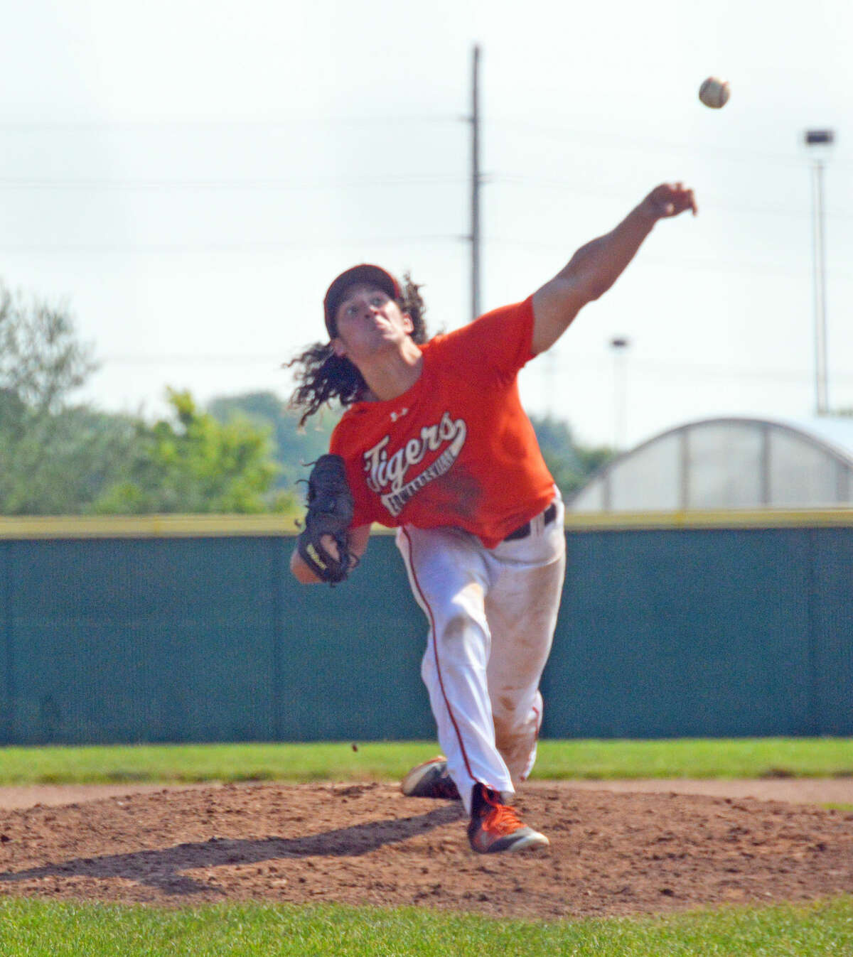 Edwardsville starting pitcher Daniel Picchiotti delivers a pitch in the second inning against the Ozark Baseball Club at Tom Pile Field.