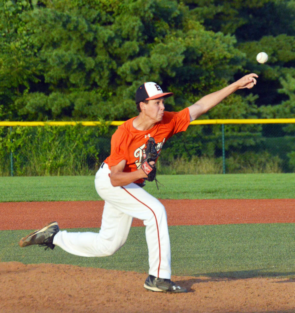 Edwardsville pitcher Isaac Garrett delivers a pitch to a Greenville hitter during the third inning Wednesday at the junior varsity field.
