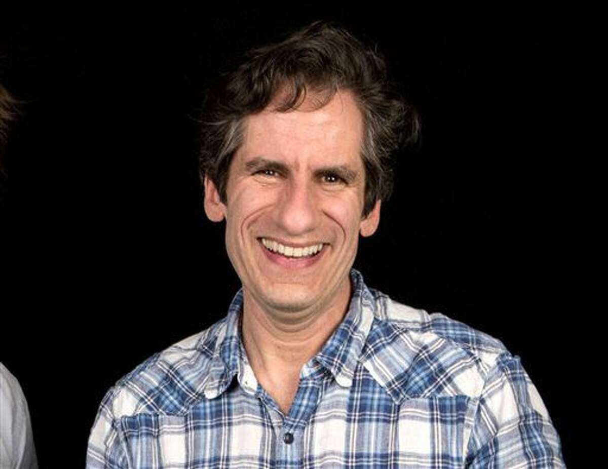 FILE - In this April 1, 2016 file photo, Seth Rudetsky poses after an interview in New York. Rudetsky and his husband, producer James Wesley enlisted a group of Broadway veterans including Audra McDonald and Idina Menzel to record a new version of the iconic 1965 song "What the World Needs Now is Love," with all proceeds going to help the LGBT Center of Central Florida. (Photo by Amy Sussman/Invision/AP, File)