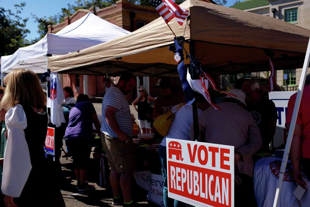 Members of San Augustine County's Republican club set up a table supporting ﻿Donald Trump at the Sassafras Festival in San Augustine in October﻿.