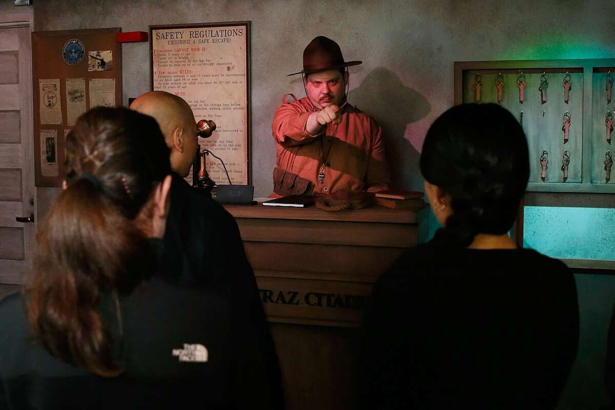 Sargent Gunter processes prisoners into Alcatraz at The San Francisco Dungeon's opening of the new 'Escape Alcatraz' drop ride and show on October 28, 2016 in San Francisco, California. (Photo by Lachlan Cunningham/Getty Images for The San Francisco Dungeon)