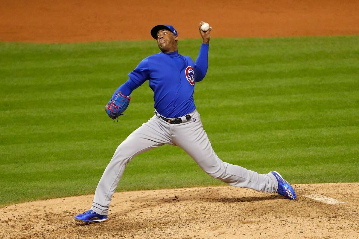 CLEVELAND, OH - NOVEMBER 02: Aroldis Chapman #54 of the Chicago Cubs throws a pitch during the eighth inning against the Cleveland Indians in Game Seven of the 2016 World Series at Progressive Field on November 2, 2016 in Cleveland, Ohio. (Photo by Jamie Squire/Getty Images)