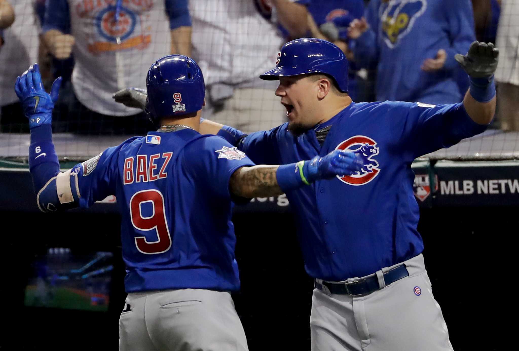 Chicago Cubs' Javier Baez hits a home run against the Cleveland Indians  during the fifth inning of Game 7 of the Major League Baseball World Series  Wednesday, Nov. 2, 2016, in Cleveland. (