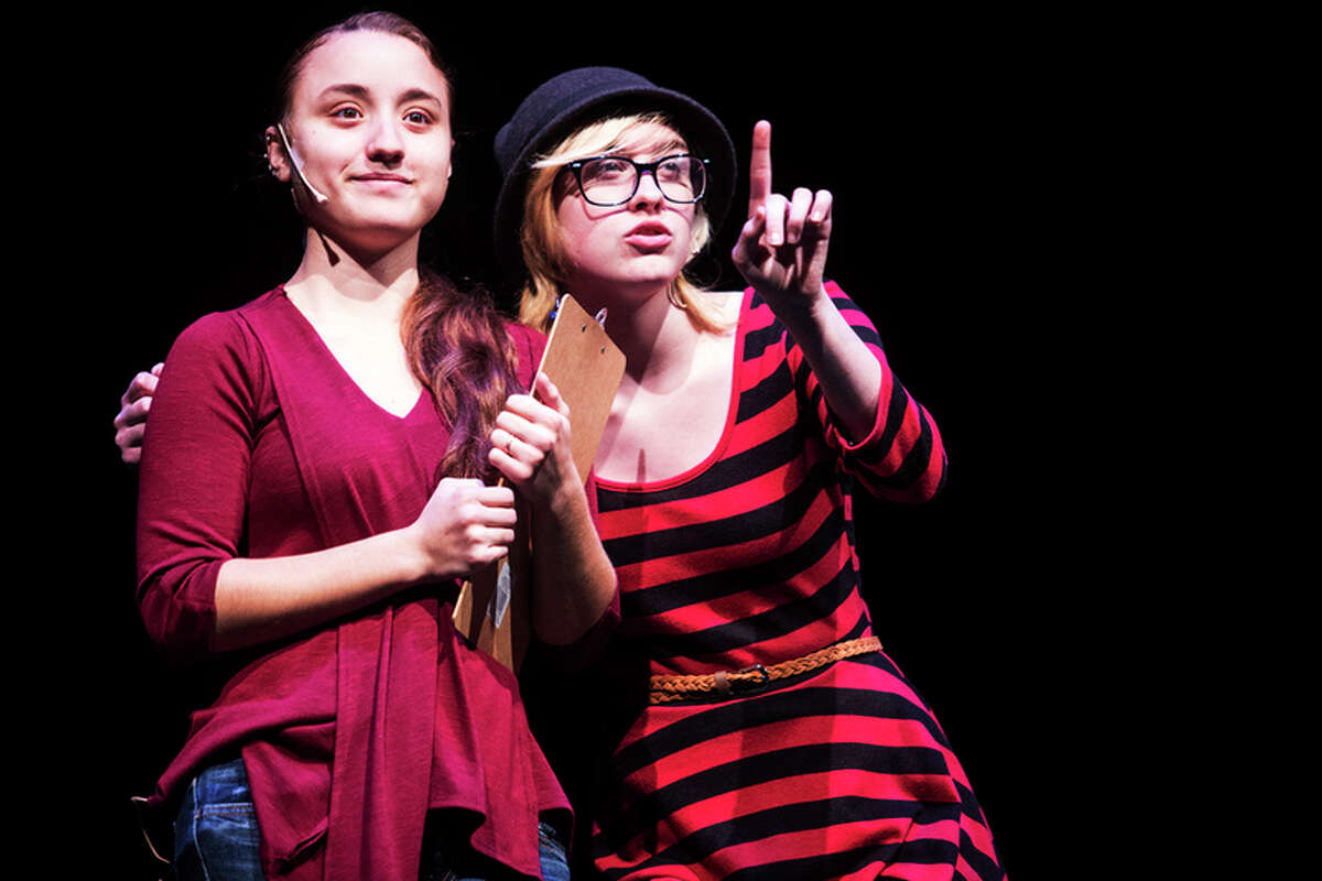 THEOPHIL SYSLO | For the Daily News Bullock Creek High School theatre students Nicole Mead, left, and Tamara Long, right, perform during a dress rehearsal of a production called Middletown at Bullock Creek High School on Wednesday.
