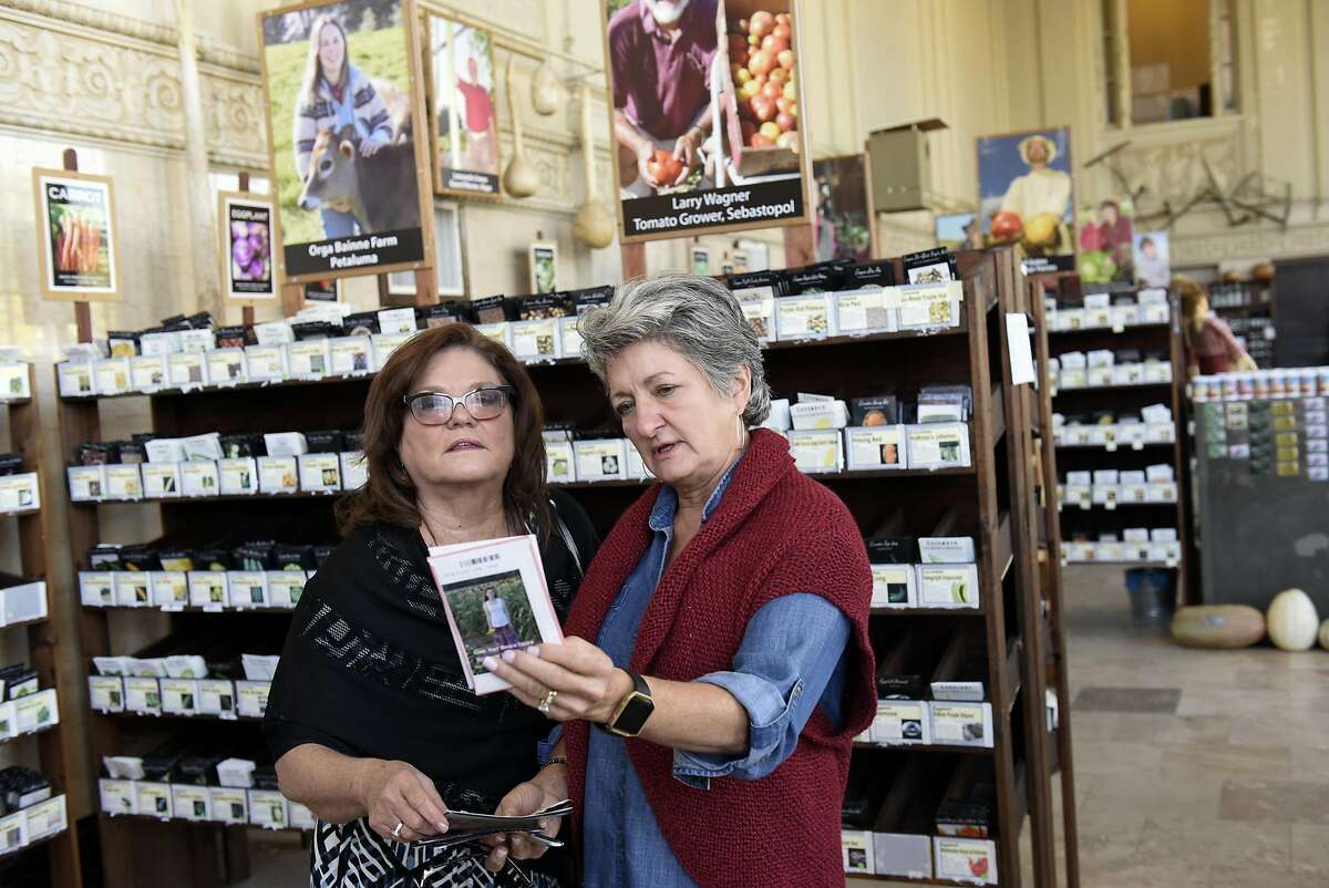 Vickie Horne, left, of Nashville and Deby Pitts of Dallas shop for seeds while visiting the Petaluma Seed Bank in Petaluma, CA, November 3, 2016.