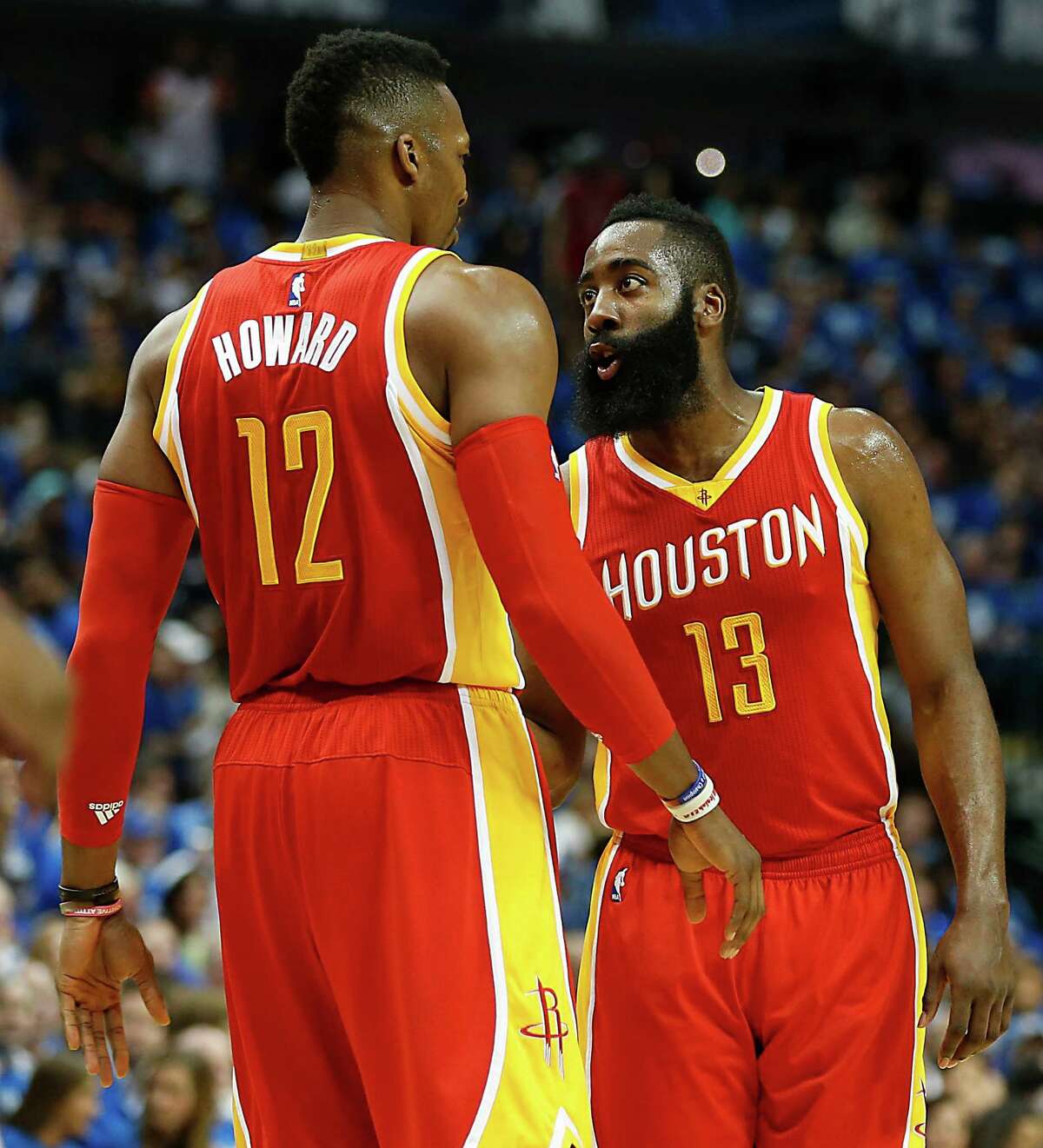Houston Rockets center Dwight Howard left, and Rockets guard James Harden during the first half of Game 4 in the first round of NBA basketball playoffs against the Dallas Mavericks at the American Airlines Center Sunday, April 26, 2015, in Dallas. ( James Nielsen / Houston Chronicle )