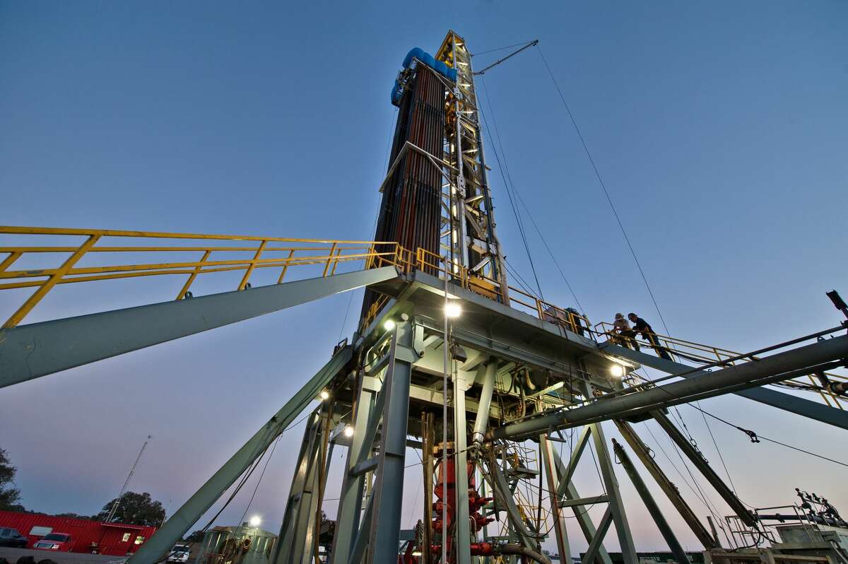 An oil & gas drilling rig is drilling a well for Pioneer Natural Resources.