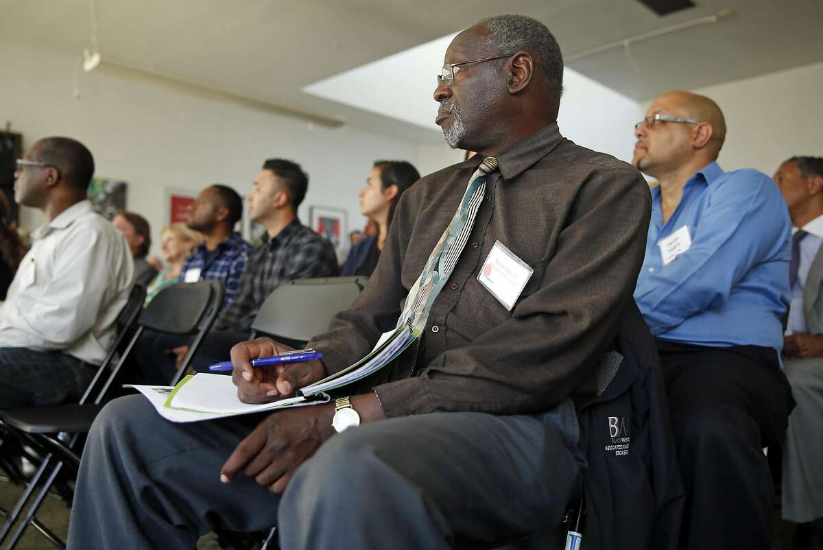 Bruce Stewart of MP Concrete Construction listens as Uber hosts an event for prospective contractors for their new headquarters on Broadway in Oakland, Calif., on Thursday, November 3, 2016.