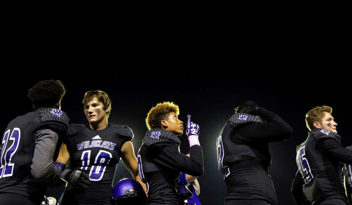 Willis defensive back Devonte Nephew (20) points toward the sky following the national anthem during a District 20-5A high school football game at Berton A. Yates Stadium Friday, Oct. 28, 2016, in Willis.