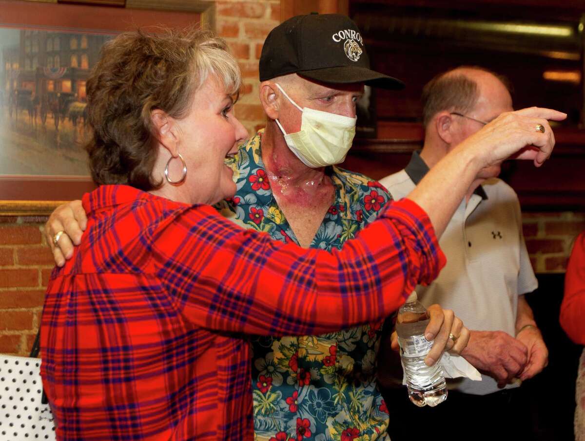 Kam Hutchins, center, visits with Jo Ann Beken, former principal at Hauke High School, to Montgomery County Sheriff Rand Henderson during Hutchins' 55th birthday party at MartinÃ©?•s Hall Thursday, Nov. 3, 2016, in Conroe. The event also served as a medical fundraiser for Hutchins, a retired teacher at Hauke and 1980 graduate of Conroe High School, who is battling tonsil cancer.