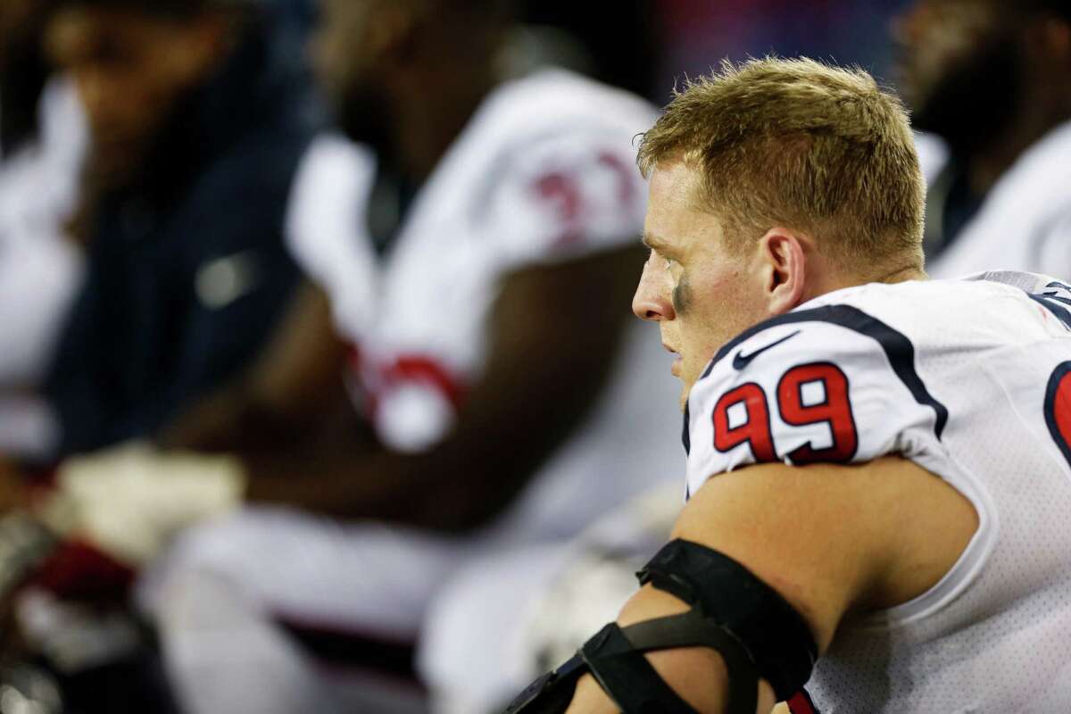 Houston Texans defensive end J.J. Watt sits on the sidelines during the second quarter of an NFL football game against the New England Patriots at Gillette Stadium on Thursday, Sept. 22, 2016, in Foxborough, Mass. ( Brett Coomer / Houston Chronicle )