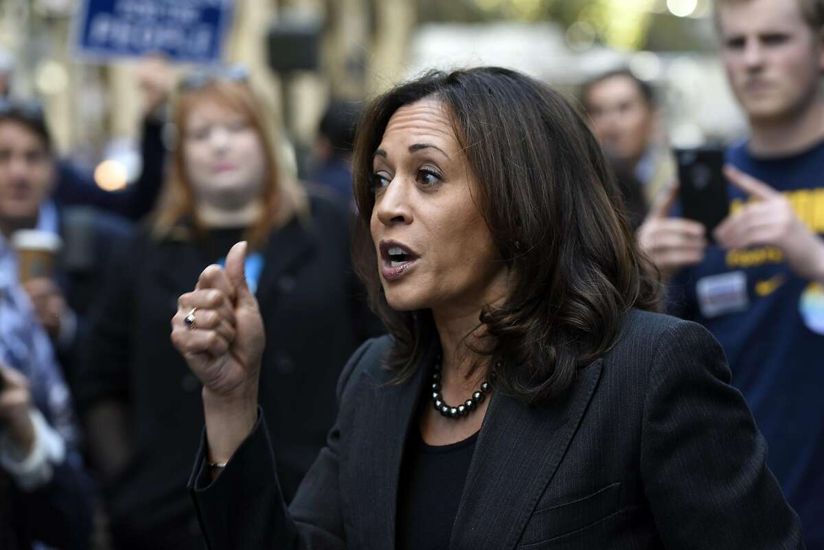 Attorney General Kamala Harris, a candidate for Senate, speaks to the crowd as she joins BART Board candidate Lateefah Simon for a campaign rally on Market St. in San Francisco CA, November 4, 2016.