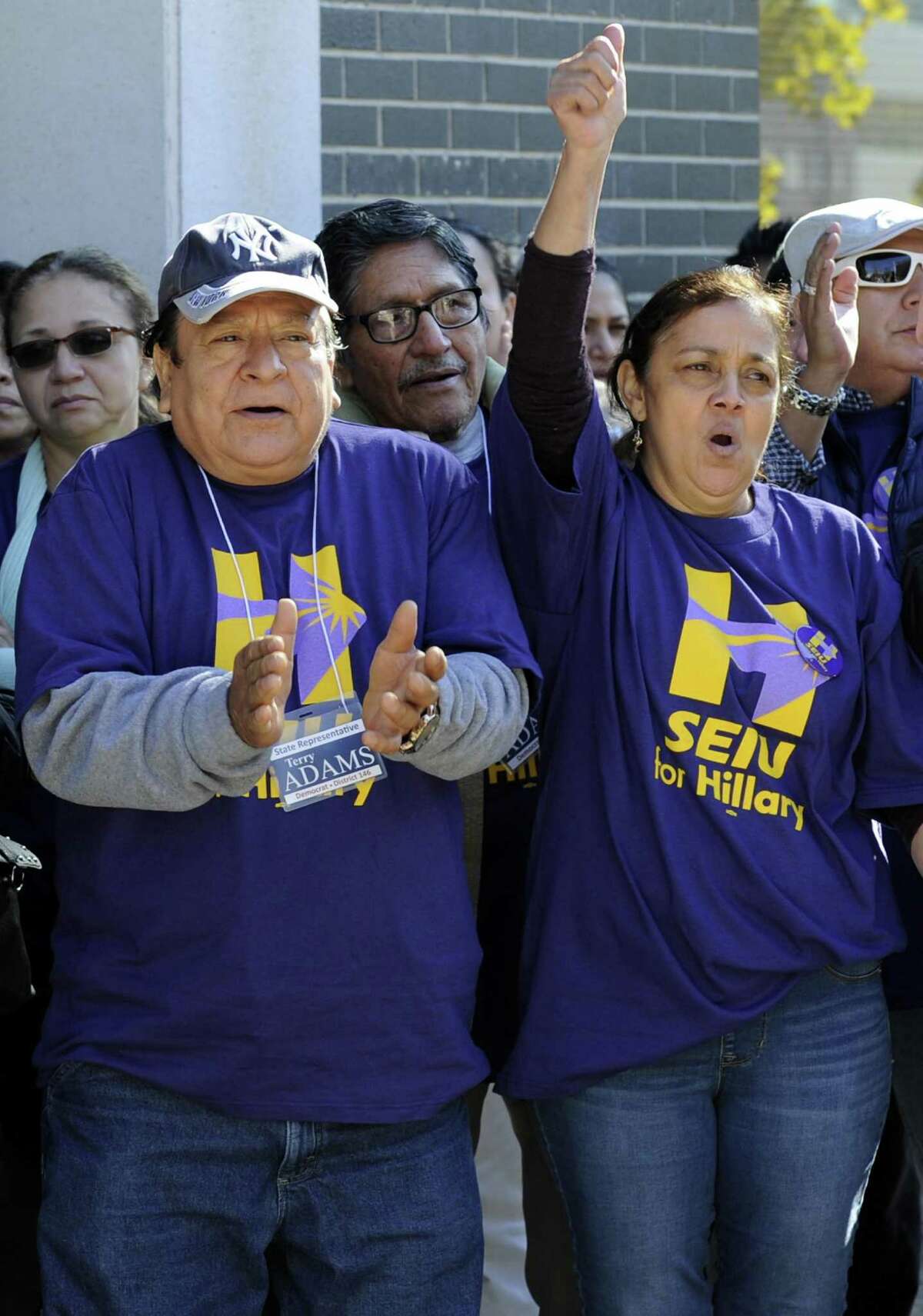 Above, State Rep. Terry Adams rallies support with the unionized workers of Local 32BJ SEIU, as they gather outside their union office in Stamford, Conn on Sat., Nov. 5, 2016. From left, Rene Polo and Aura Duarte,along with other unionized workers of Local 32BJ SEIU, rally support for Presidential candidate Hillary Clinton outside their union offices in Stamford, Conn on Sat., Nov. 5, 2016.