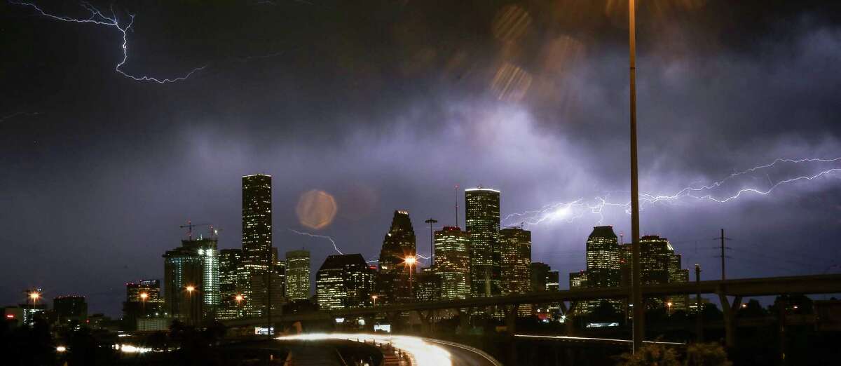 Lightning flashes over the Houston skyline. (Jon Shapley / Houston Chronicle )