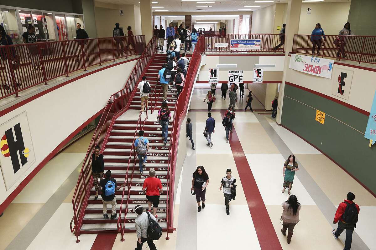 Students head to classrooms at Judson High School, Monday, April 13, 2015. Bexar County's public school attrition rates have remained stubbornly high over the past several years, according to an annual report released by the Intercultural Development Research Association. At 28 percent, San Antonio leads other metropolitan areas in Texas with its attrition rate, which measures how many students leave school during a certain time period. Factors that exacerbate dropout rates include zero tolerance policies, weak curriculums, poor funding and an emphasis on high-stakes testing.
