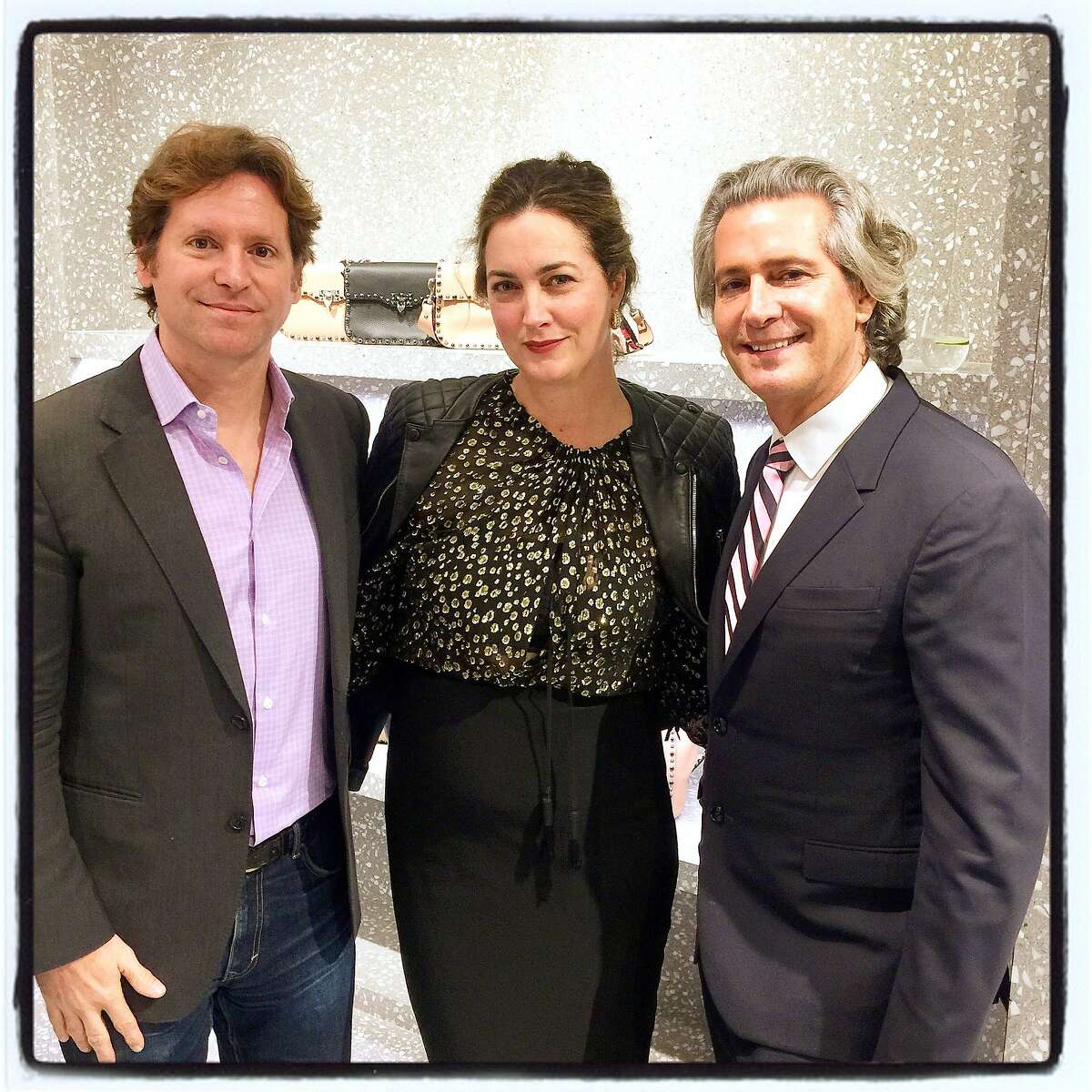 Trevor and Alexis Traina (left) with Valentino global ambassador Carlos Souza at the boutique for Fulk's book signing. Oct 2016.