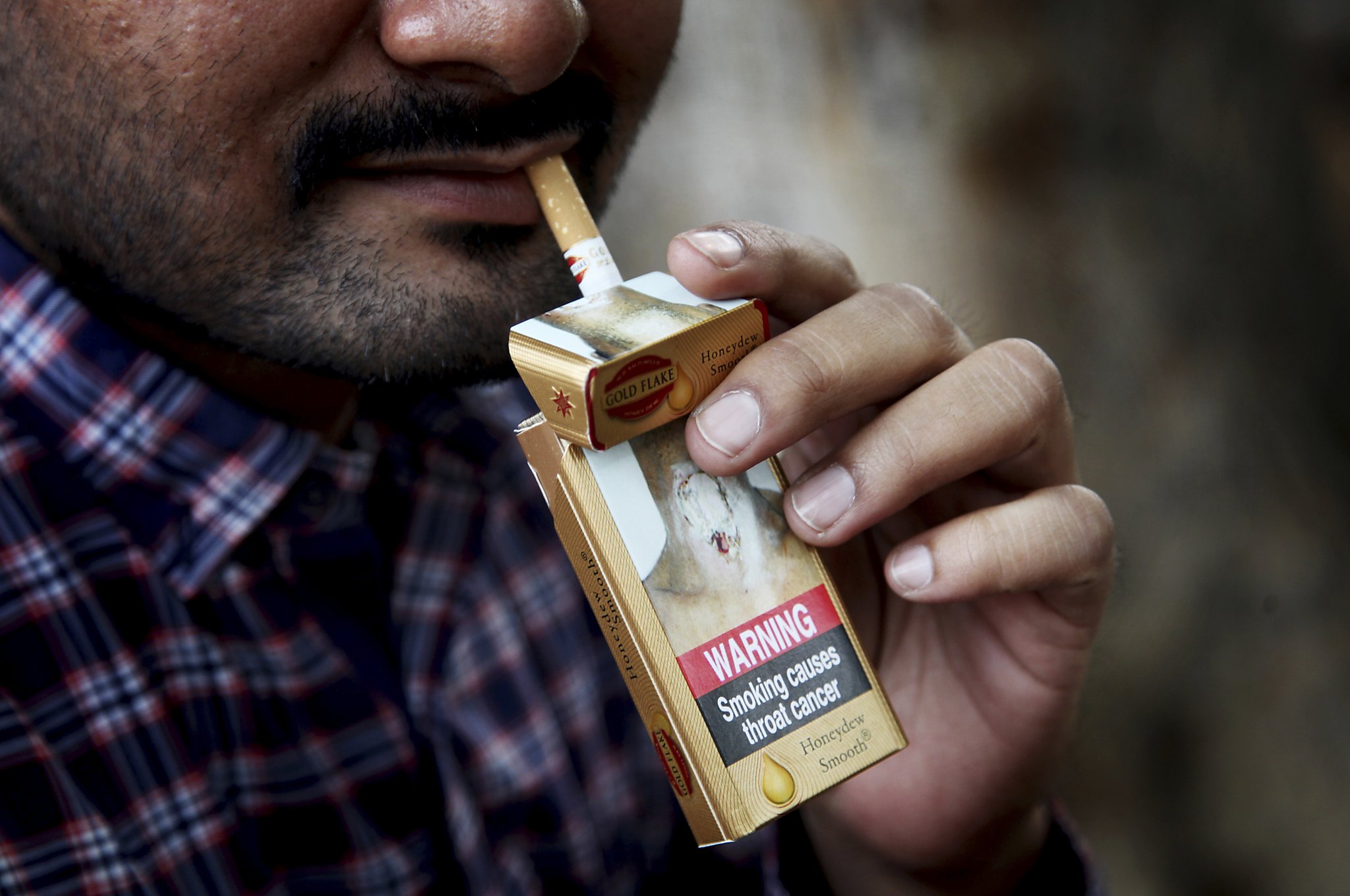 honeydew smooth cigarette price in india Gold Flake Asian nations review war against