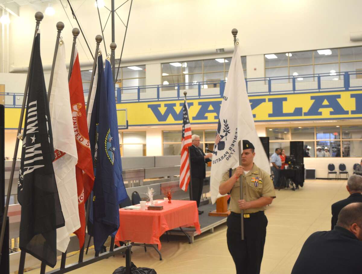A member of the Plainview High Naval Jr. ROTC prepares to post the Coast Guard flag with those of the U.S. Army, U.S. Navy, U.S. Marine Corps and U.S. Air Force on Sunday during the Veterans Day Appreciation Banquet. Hosted by Plainview Elks Lodge, the program in Wayland’s Laney Activity Center drew about 350 veterans. It was the first of several tributes planned this week for Veterans Day. Beginning at 9 a.m. Thursday, the American Legion Auxiliary will be outside United and Amigos Supermarkets distributing poppies to benefit veterans and their families. From 7-9 a.m. Friday, American Legion Auxiliary will serve breakfast to veterans and spouses at the Plainview Elks Lodge. Beginning at 9:30 a.m. Friday, Coronado and Estacado middle schools will host their annual Veterans Day Assembly. This year the program is at Coronado Middle School gym, 24th and Joliet. Veterans, active duty personnel and the public are invited. At 11 a.m. Friday, the American Legion Auxiliary will host a program honoring veterans at the Veterans Memorial outside the courthouse. At 6 p.m., Plainview High School will host its annual Veterans Day Assembly and Banquet in the PHS cafeteria.