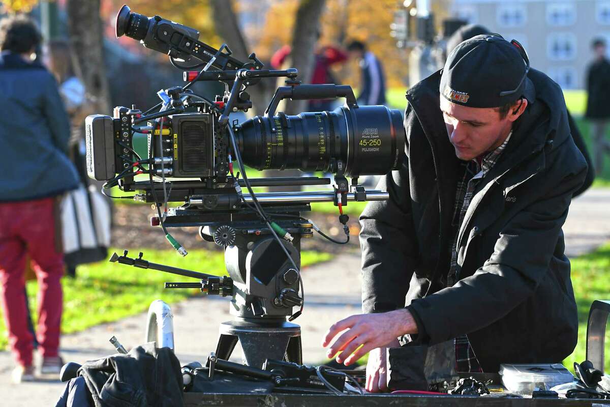 A cameraman sets up a camera while the movie, "The Pretenders," is filmed on the campus of Union College on Monday, Nov. 7, 2016 in Schenectady, N.Y. (Lori Van Buren / Times Union)