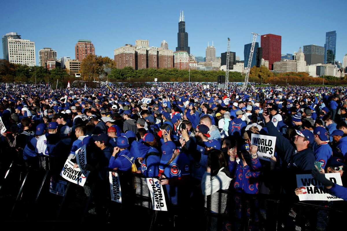 Chicago Cubs fans celebrate before a rally in Grant Park last Friday honoring the World Series baseball champions. ﻿Chicago's Office of Emergency Management and Communications estimated that 5 million people attended the event.