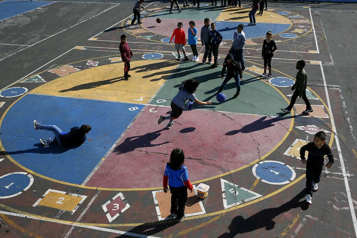 Students enjoys recess time and a game of four square at Glen Park Elementary School in San Francisco, California, on Thursday November 3, 2016