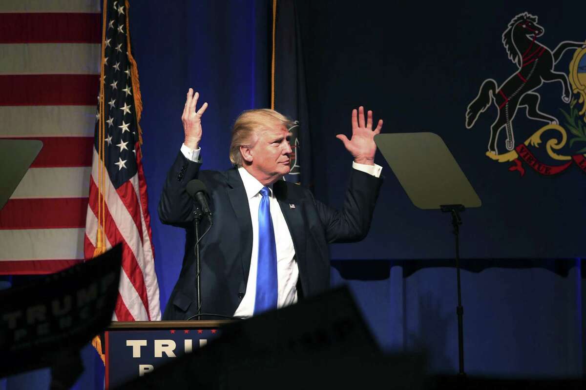 Republican presidential candidate Donald Trump waves his hands as he speaks during a campaign rally Monday, Nov. 7, 2016, in Scranton, Pa. (AP Photo/Mel Evans)