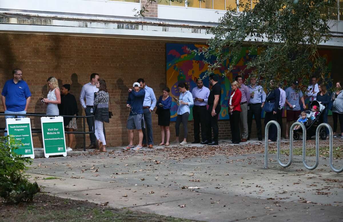 People wait in line to vote as the polls open at the Love Park Community Center, Tuesday, Nov. 8, 2016, in Houston, Texas. (Jon Shapley/Houston Chronicle)