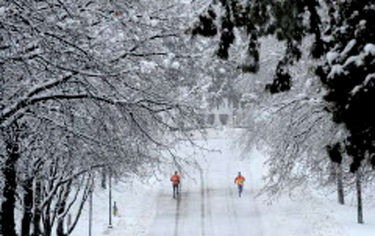 February 2010: A snowstorm dropping 10 to 15 inches of snow on the Capital Region on Feb. 23-24 was followed by a mixed-precipitation storm two days later, leaving a lot of heavy slush. Joggers use Congress Park in Saratoga Springs, New York as refuge from some of the snow Feb. 24, 2010.