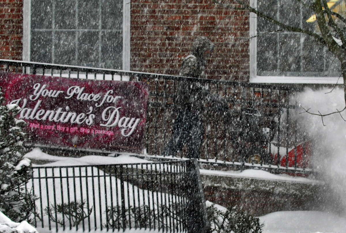 Feb. 14, 2007: A snowstorm dropped more than a foot on the immediate Capital Region, interrupting a lot of Valentine's Day plans. Bill Coffin clears a sidewalk at the Ballston Spa Post Office in Ballston Spa on Feb. 14, 2007.