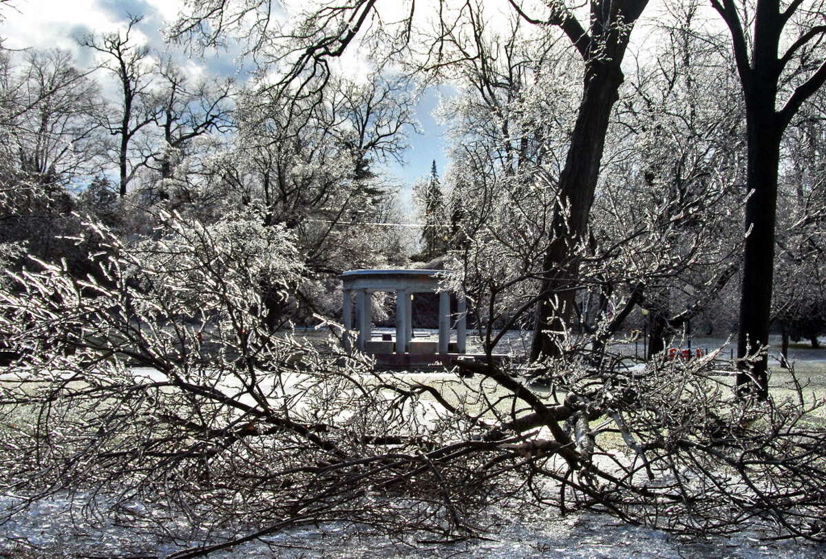 Jan. 14-15, 2007: An unseasonably warm winter crashed to a halt with an ice storm that left much of Saratoga County without power. Veteran's Memorial in Congress Park is framed by ice covered trees and downed limbs in Saratoga Springs, Jan. 16, 2007.