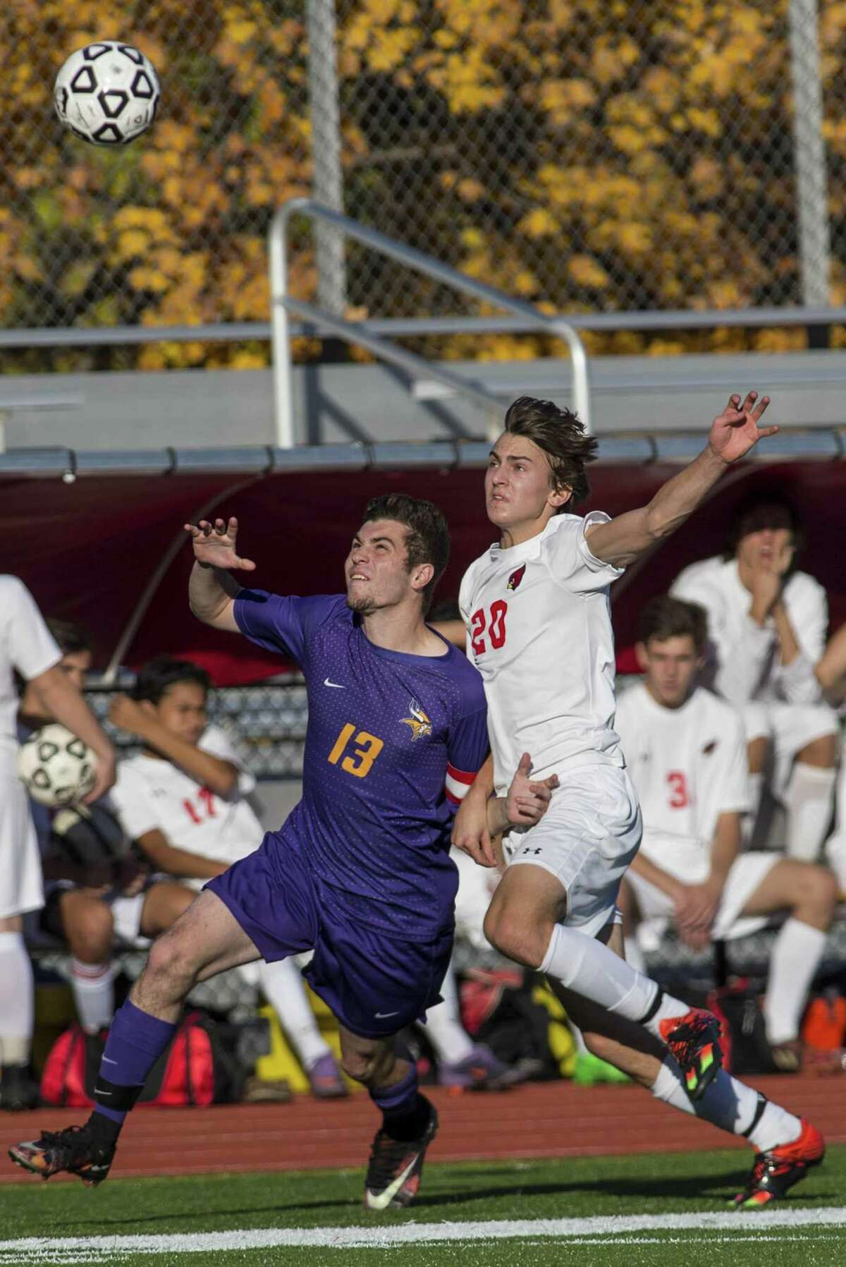 Westhill’s Frank Dente and Greenwich’s Timothy Bennett battle for the ball during Tuesday’s CIAC Class LL boys soccer tournament first round game.